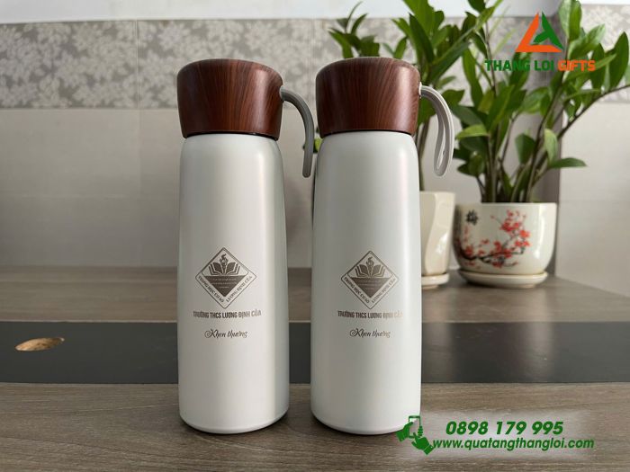 Bình Giữ Nhiệt Nắp Vân Gỗ Nâu Khắc Logo Trường LDC Làm Qùa Tặng Khen Thưởng