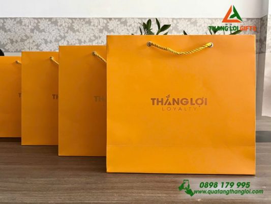 Túi Xách Giấy Ivory Màu Vàng – Ép Kim Logo Doanh Nghiệp Thắng Lợi 