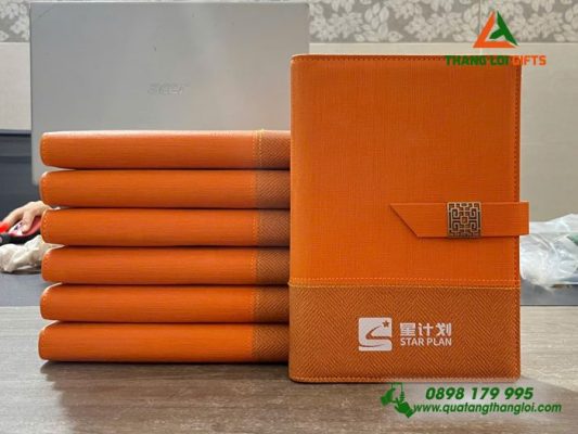 Mẫu Sổ Da Bìa Còng Màu Cam In Logo Doanh Nghiệp Luxshare ICT Cao Cấp