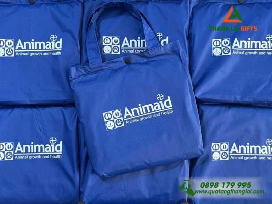 Áo Mưa Cánh Dơi Vải Tổ Ong Màu Xanh In Logo Doanh Nghiệp Animaid