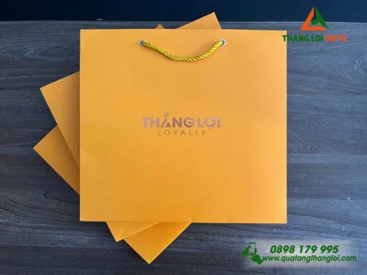 Túi Xách Giấy Ivory Màu Vàng – Ép Kim Logo Doanh Nghiệp Thắng Lợi
